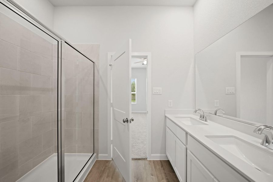 Furnished interior view inside a new home in Creekland Village at Bridgeland, Cypress (Image 7).