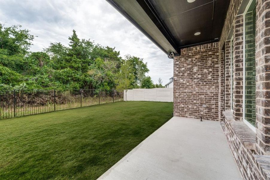 Exterior details and patio area of a home in , McKinney (Image 21).