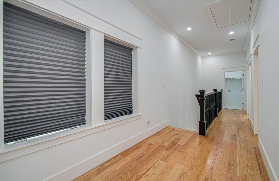 Hardwood floors flow the landing up the stairs and take you to the bedrooms.