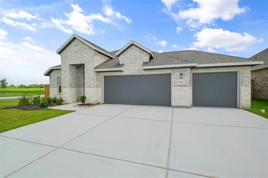 Front exterior of a new home in Sierra Vista, Rosharon, TX, highlighting curb appeal (Image 2). Front exterior of a new home in Sierra Vista, Rosharon, TX, highlighting curb appeal (Image 2).
