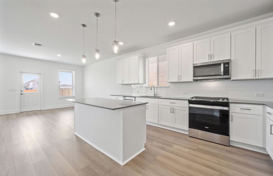 Furnished interior view inside a new home in Crosswinds, Kyle (Image 8).