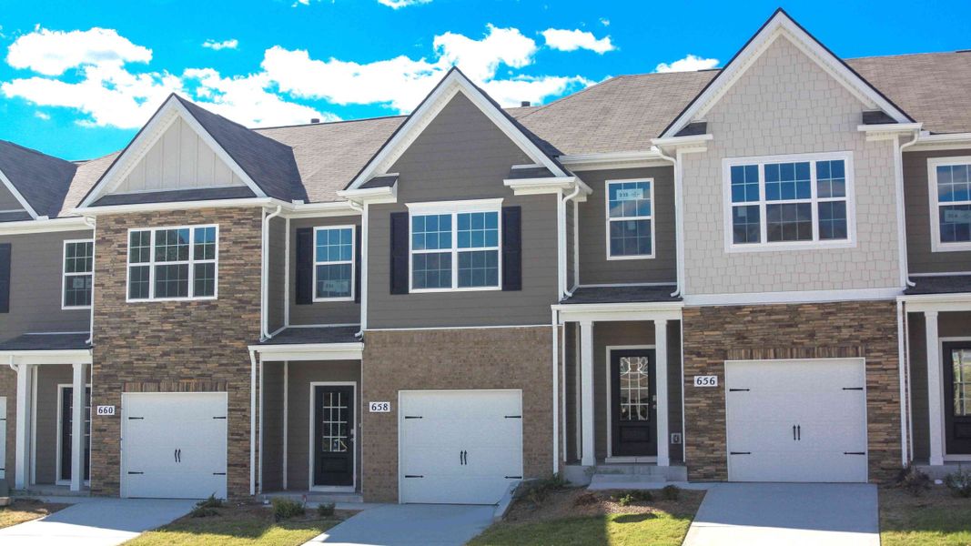Front exterior of a new home in Woodbridge Glen Townhomes, Lebanon, TN, highlighting curb appeal (Image 1).