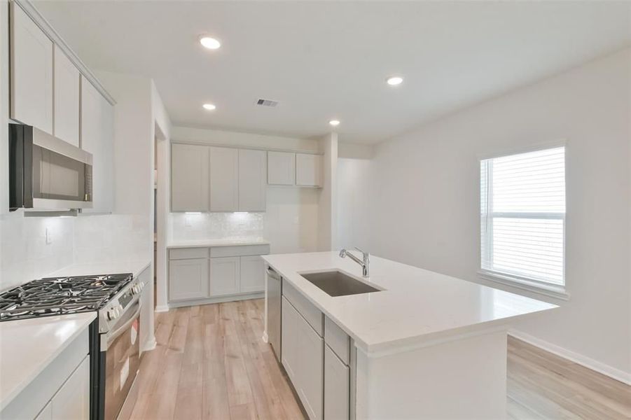 Furnished interior view inside a new home in Lakes at Black Oak, Magnolia (Image 39).