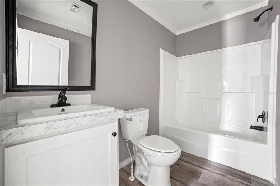 Furnished interior view inside a new home in , Okeechobee (Image 8).