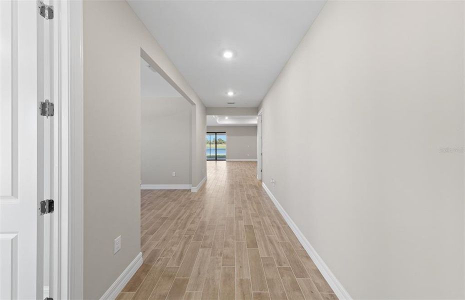 Spacious, unfurnished interior of a new home in The Strand at Cedar Grove, North Port (Image 22).