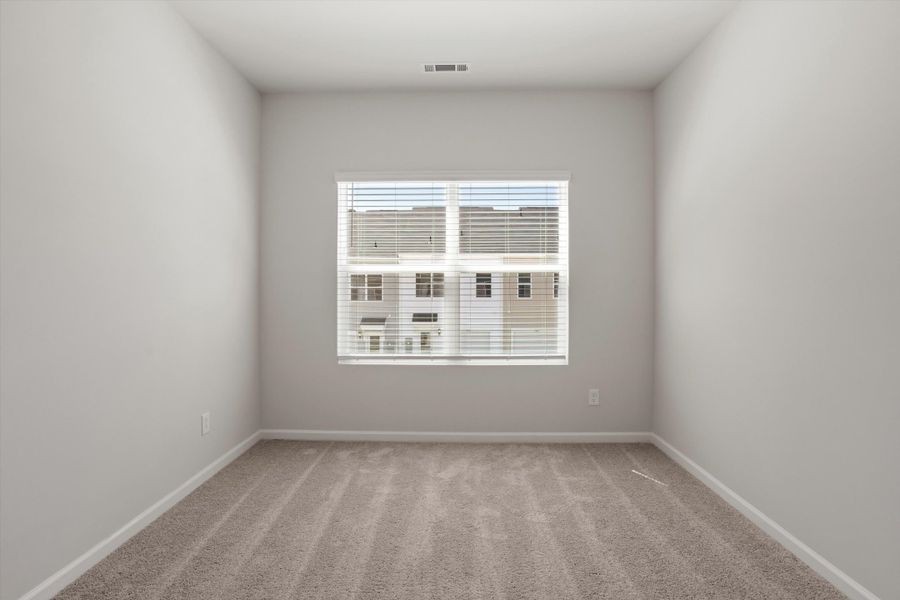 Spacious, unfurnished interior of a new home in Renaissance at White Oak, Garner (Image 23).