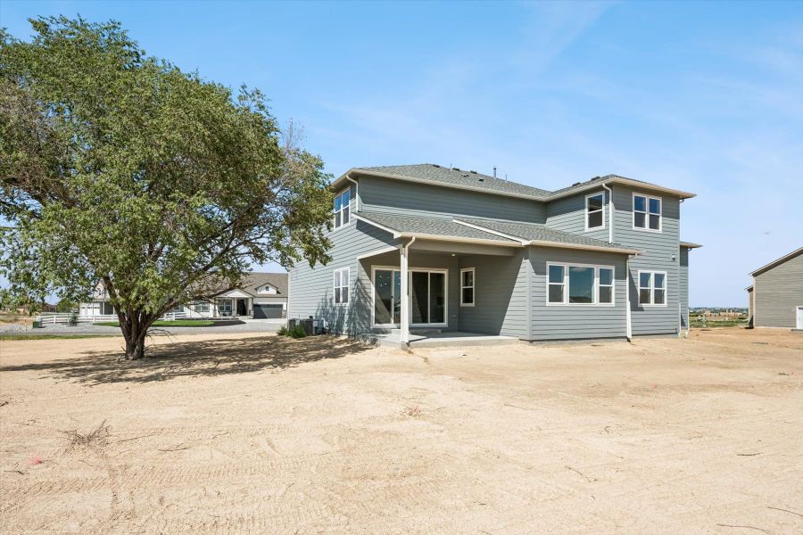 Exterior details and patio area of a home in Baseline Lakes – Brighton, Brighton (Image 20).