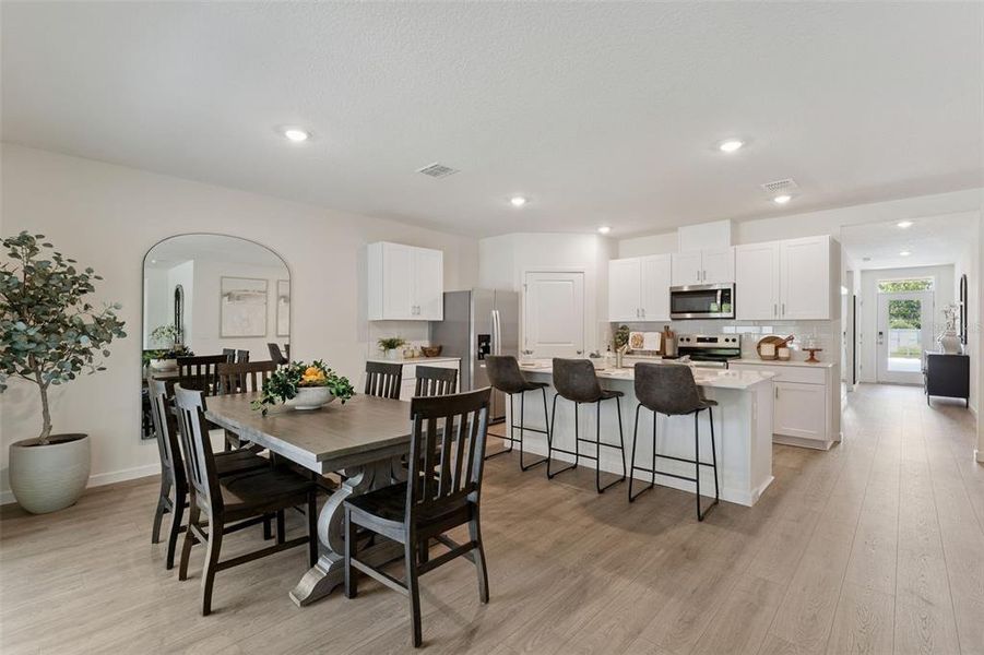 Furnished interior view inside a new home in Crossroads at Kelly Park, Apopka (Image 8).