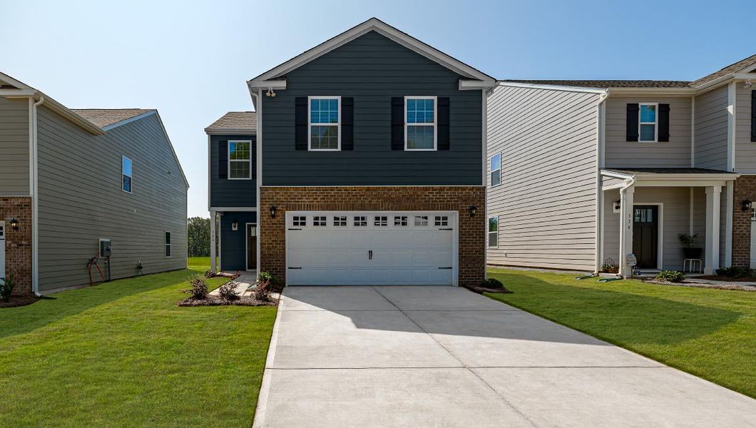 Front exterior of a new home in Clark Creek Landing, Lincolnton, NC, highlighting curb appeal (Image 1). Front exterior of a new home in Clark Creek Landing, Lincolnton, NC, highlighting curb appeal (Image 1).