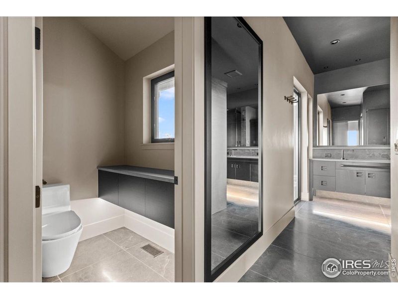 Bidet toilet, floating cabinet, motion sensor lighting