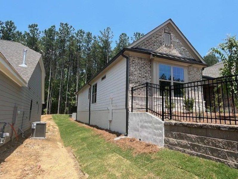 Front exterior of a new home in Soleil Belmont Park, Canton, GA, highlighting curb appeal (Image 24).