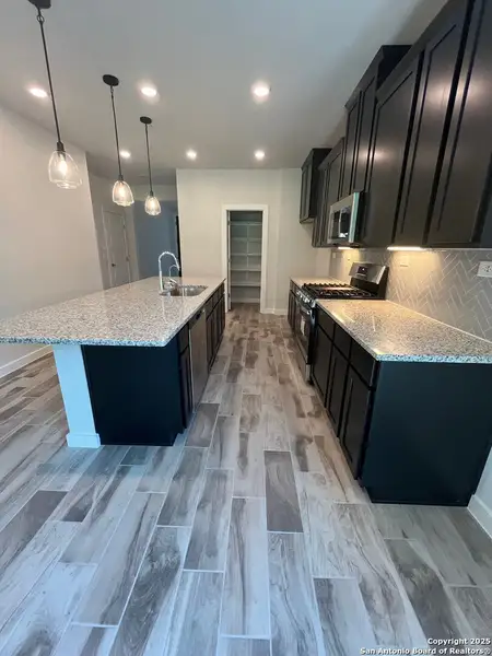 Furnished interior view inside a new home in The Meadows at Hunters Ranch, San Antonio (Image 4). Furnished interior view inside a new home in The Meadows at Hunters Ranch, San Antonio (Image 4).