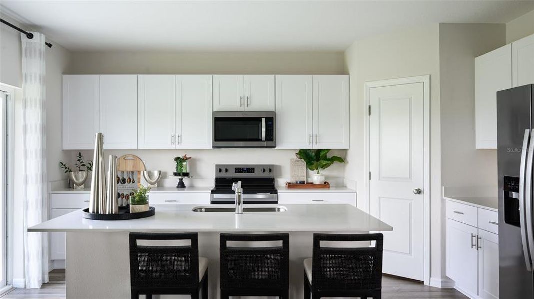 Furnished interior view inside a new home in Villa Mar, Winter Haven (Image 6). Furnished interior view inside a new home in Villa Mar, Winter Haven (Image 6).