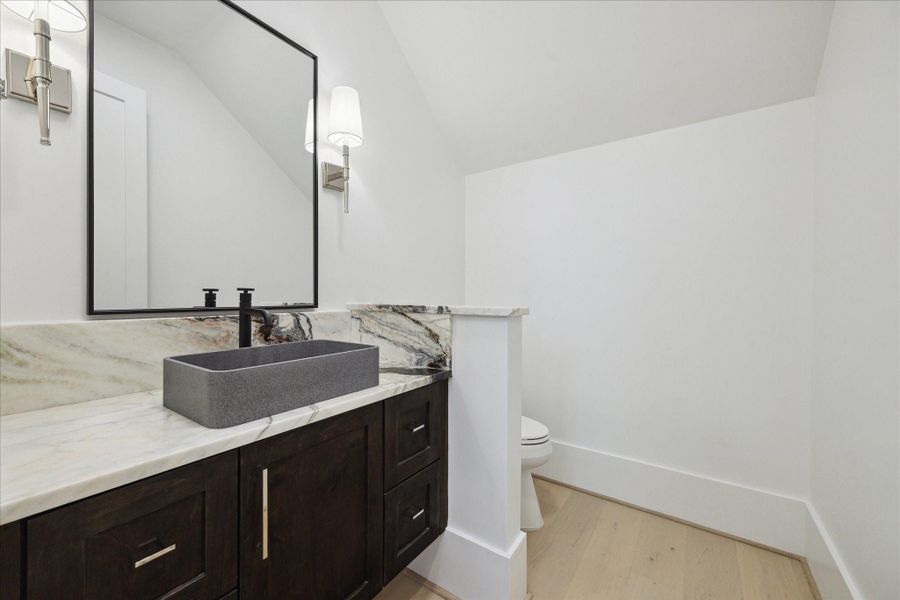 Formal Powder bath with sconces flanking mirror Formal Powder bath with sconces flanking mirror