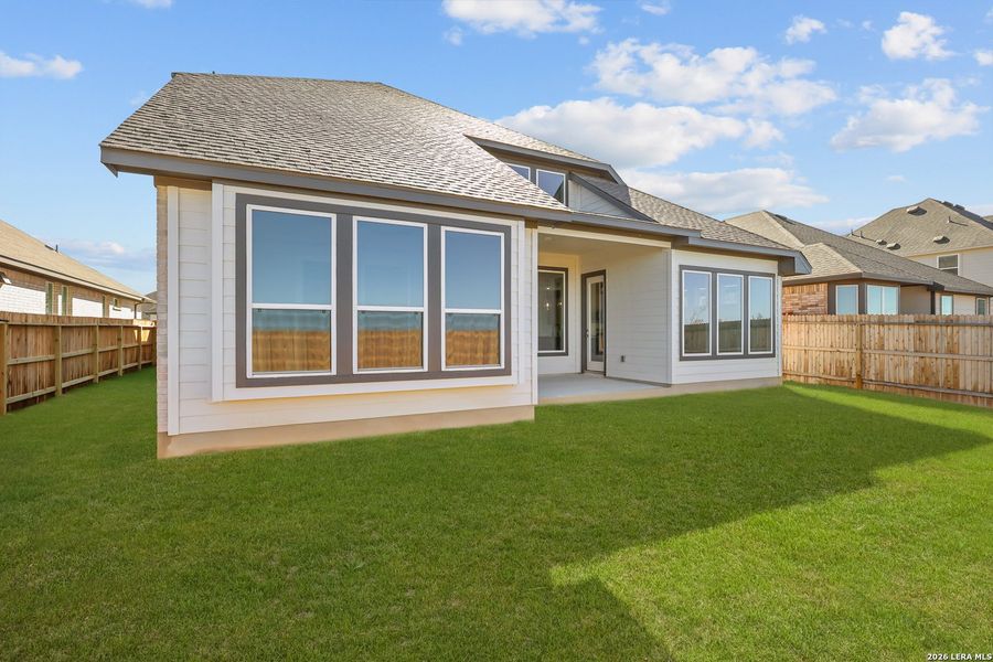 Exterior details and patio area of a home in Megan's Landing, Castroville (Image 4).