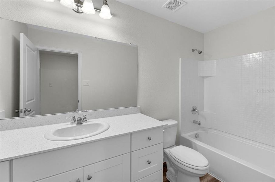 Furnished interior view inside a new home in Oakfield Lakes, Parrish (Image 8).