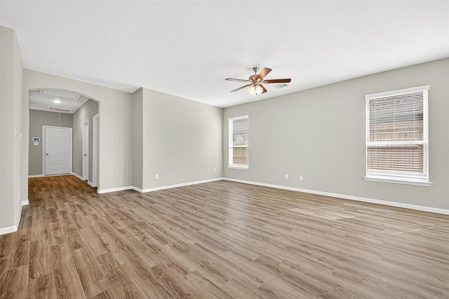 Spacious, unfurnished interior of a new home in Sunterra, Katy (Image 41).