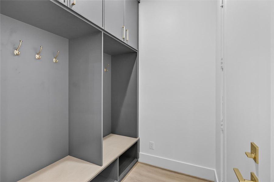 Conveniently located just off the garage entrance, this thoughtfully designed mud room provides the perfect drop zone for everyday essentials while offering seamless access to both the main hallway and garage. Conveniently located just off the garage entrance, this thoughtfully designed mud room provides the perfect drop zone for everyday essentials while offering seamless access to both the main hallway and garage.