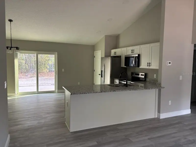 Furnished interior view inside a new home in , Dunnellon (Image 3).