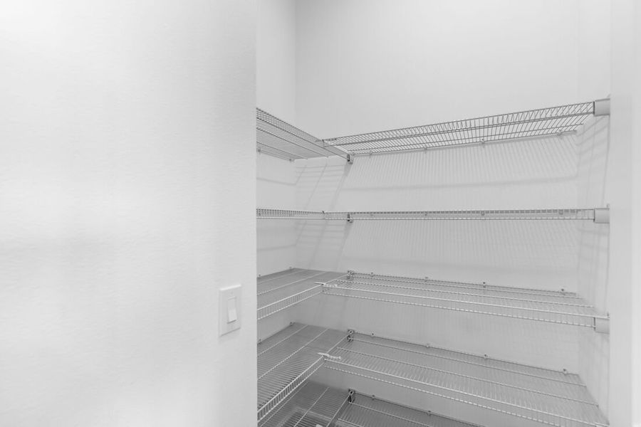 Representative unfurnished interior of a home built from the Ambra by Taylor Morrison in Esplanade at Center Lake Ranch, St. Cloud (Image 12).