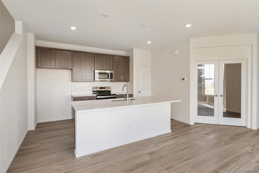 Furnished interior view inside a new home in Windler Villas, Aurora (Image 7).