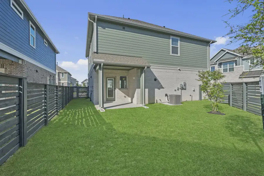 Representative exterior details of a home built from the Riverdale by Chesmar Homes in Bridgeland, Elgin (Image 3).