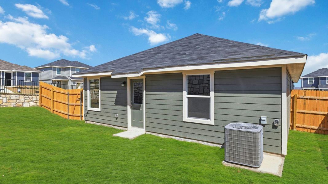 Exterior details and patio area of a home in Wayside, Uhland (Image 3).