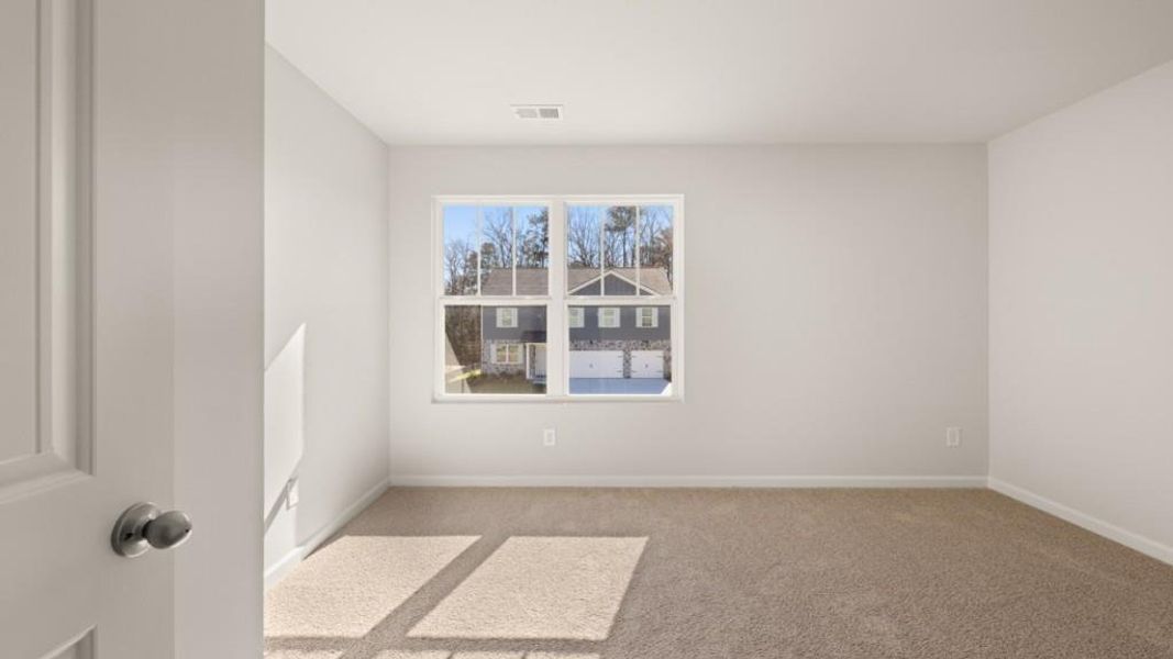 Spacious, unfurnished interior of a new home in Northwoods at Mirror Lake, Villa Rica (Image 22).