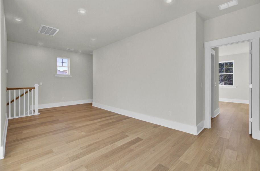Spacious, unfurnished interior of a new home in Indigo Grove Single Family Homes, Johns Island (Image 41).
