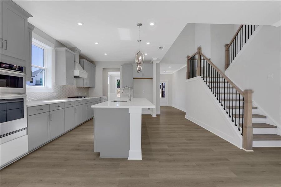 Furnished interior view inside a new home in The Paddocks at Doc Hughes, Buford (Image 4).