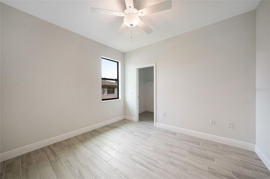 Spacious, unfurnished interior of a new home in , Port Charlotte (Image 42).