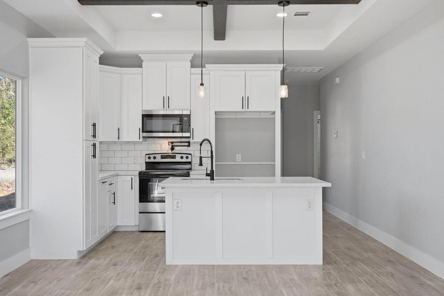 Furnished interior view inside a new home in , Willis (Image 5).