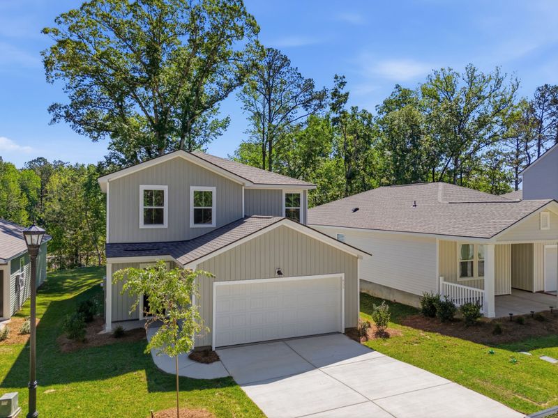 Front exterior of a new home in Grand Arbor, Blythewood, SC, highlighting curb appeal (Image 17). Front exterior of a new home in Grand Arbor, Blythewood, SC, highlighting curb appeal (Image 17).