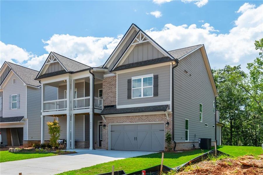 Front exterior of a new home in , Flowery Branch, GA, highlighting curb appeal (Image 30). Front exterior of a new home in , Flowery Branch, GA, highlighting curb appeal (Image 30).