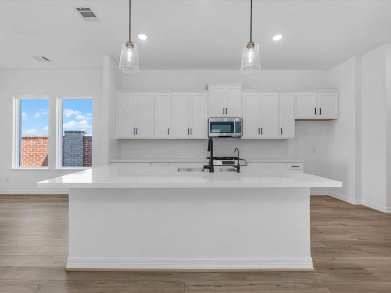Kitchen. Sample product photo. Actual exterior and interior selections may vary by homesite. Photo may be virtually staged.
