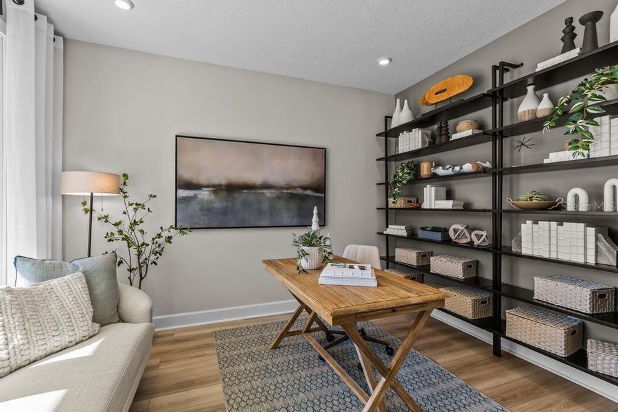 Furnished interior view inside a new home in The Cypress Series at Reserve East, Flagler Beach (Image 19).