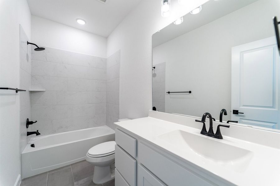 Furnished interior view inside a new home in Green Meadows, Celina (Image 10).
