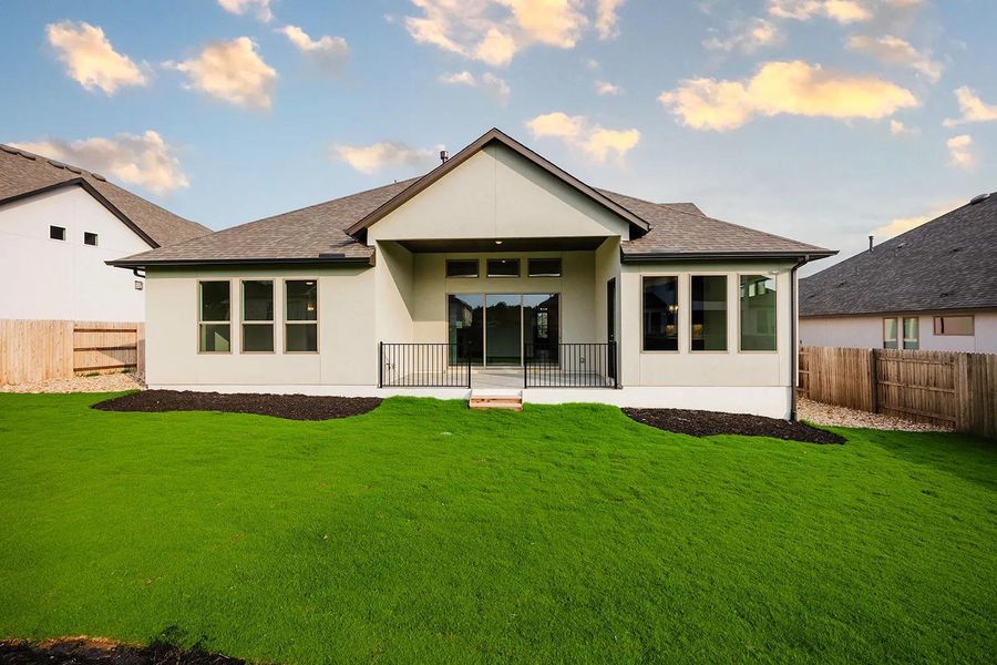 Front exterior of a new home in Caliterra - 70', Dripping Springs, TX, highlighting curb appeal (Image 17). Front exterior of a new home in Caliterra - 70', Dripping Springs, TX, highlighting curb appeal (Image 17).
