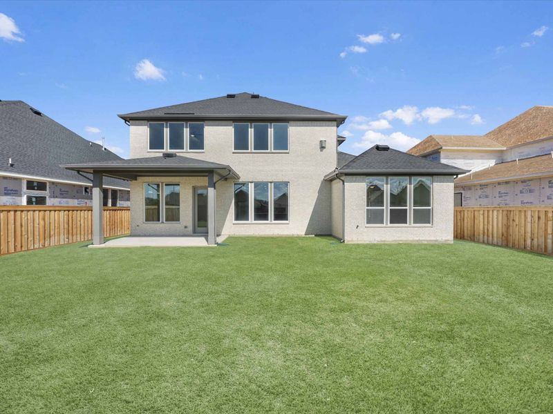 Exterior details and patio area of a home in Dunham Pointe 60′, Cypress (Image 4).