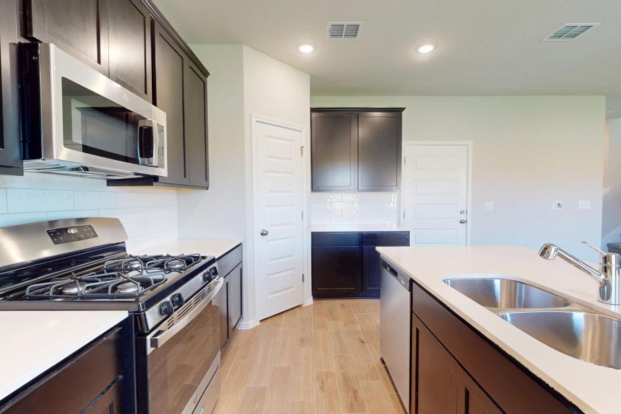Furnished interior view inside a new home in Cascades at Onion Creek, Austin (Image 7). Furnished interior view inside a new home in Cascades at Onion Creek, Austin (Image 7).