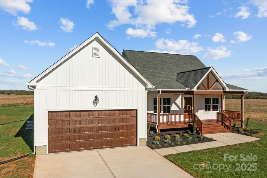 Front exterior of a new home in , Olin, NC, highlighting curb appeal (Image 21). Front exterior of a new home in , Olin, NC, highlighting curb appeal (Image 21).