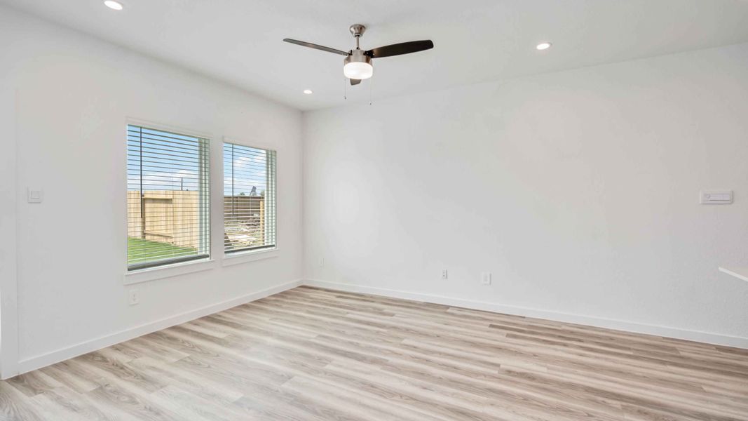 Representative unfurnished interior of a home built from the Hibiscus by D.R. Horton in City Gate North, Houston (Image 9).