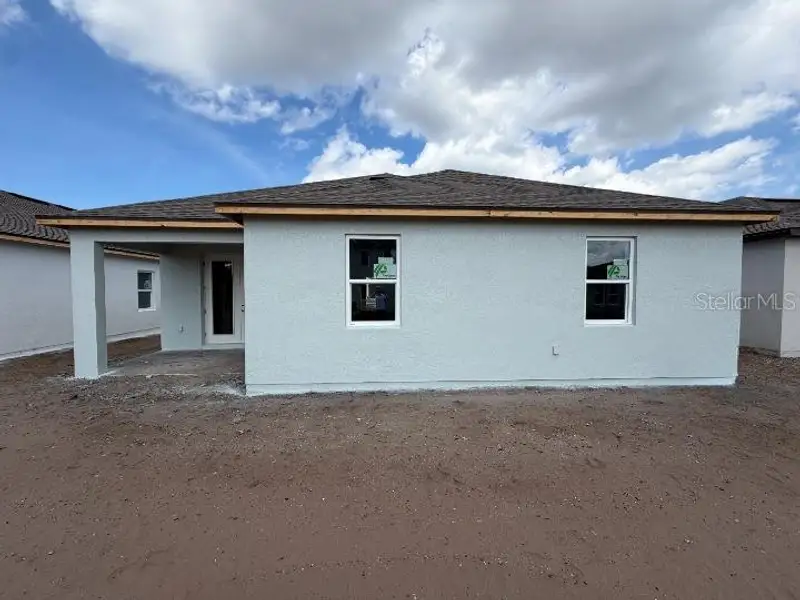 Exterior details and patio area of a home in Sunbrooke, St. Cloud (Image 5).