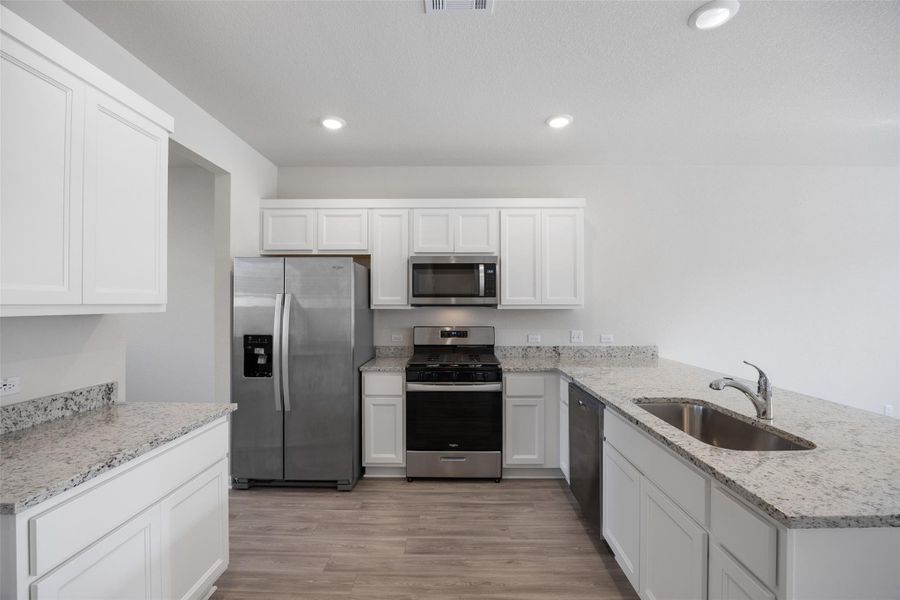 Furnished interior view inside a new home in Avery Centre, Round Rock (Image 6).