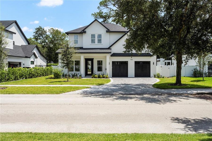 Front exterior of a new home in , Winter Park, FL, highlighting curb appeal (Image 27).