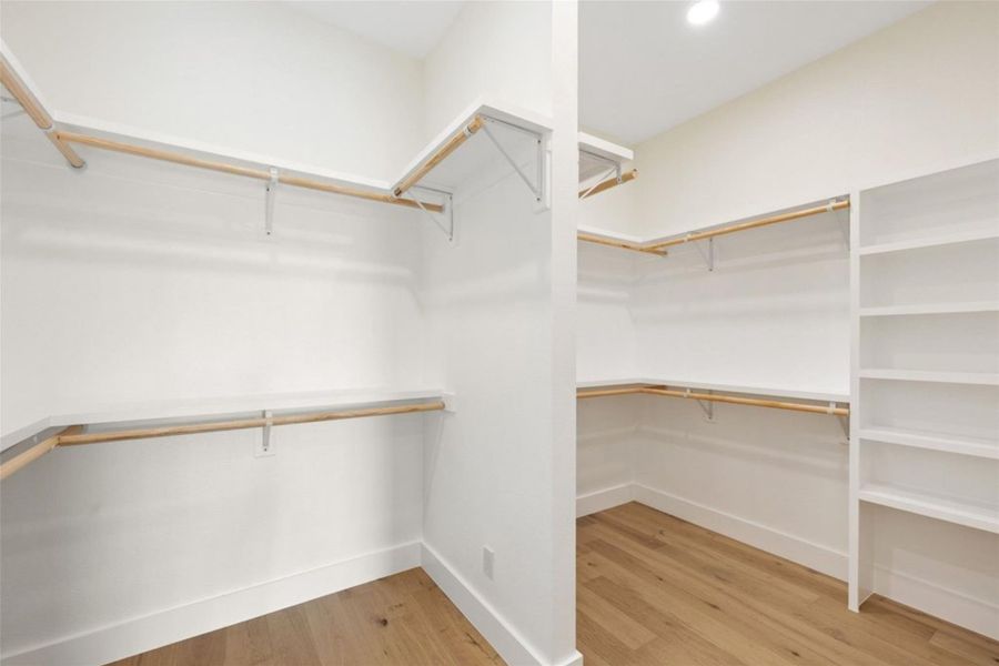 Customizable closet with ample shelving and hanging space to organize your wardrobe. Customizable closet with ample shelving and hanging space to organize your wardrobe.