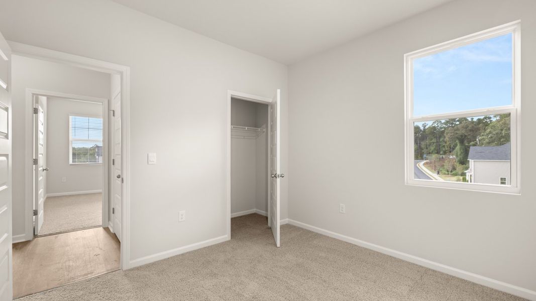 Representative unfurnished interior of a home built from the Avion by D.R. Horton in Brooks Station, Dacula (Image 20).