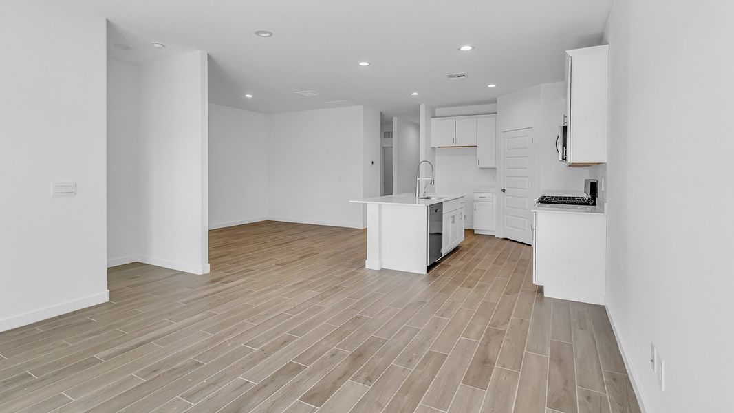Representative unfurnished interior of a home built from the Harris by D.R. Horton in The Oasis at Rocking K, Vail (Image 31).