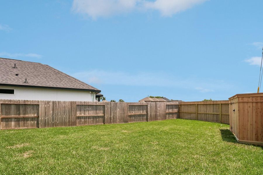 Exterior details and patio area of a home in Sienna 40', Missouri City (Image 21). Exterior details and patio area of a home in Sienna 40', Missouri City (Image 21).