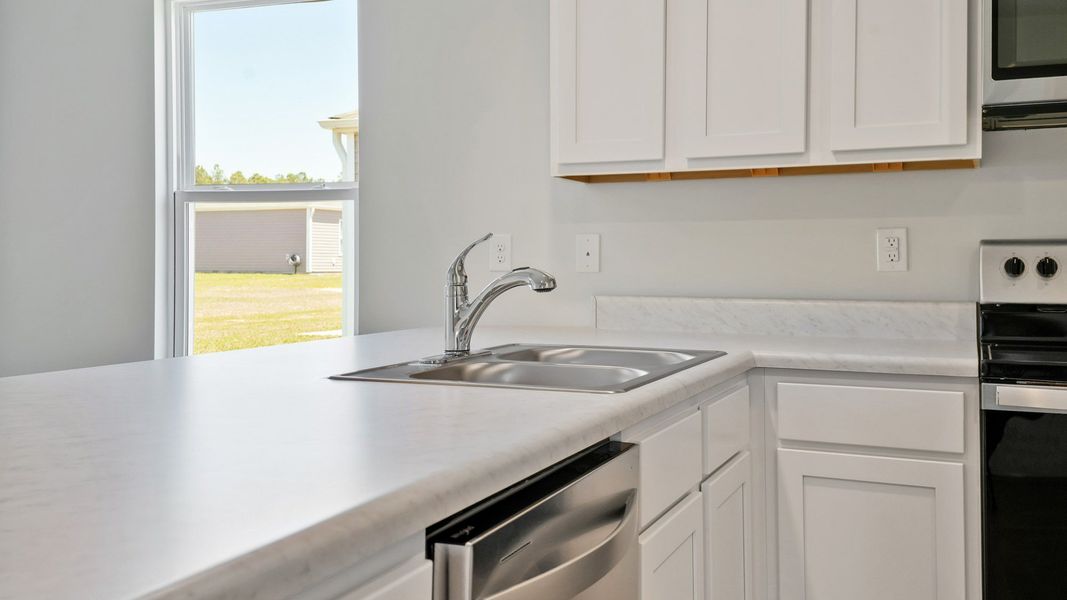 Furnished interior view inside a new home in Lockwood Landing, Supply (Image 8).